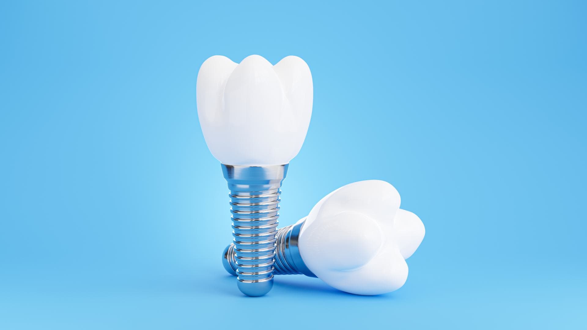 Implante dental sobre maqueta odontológica